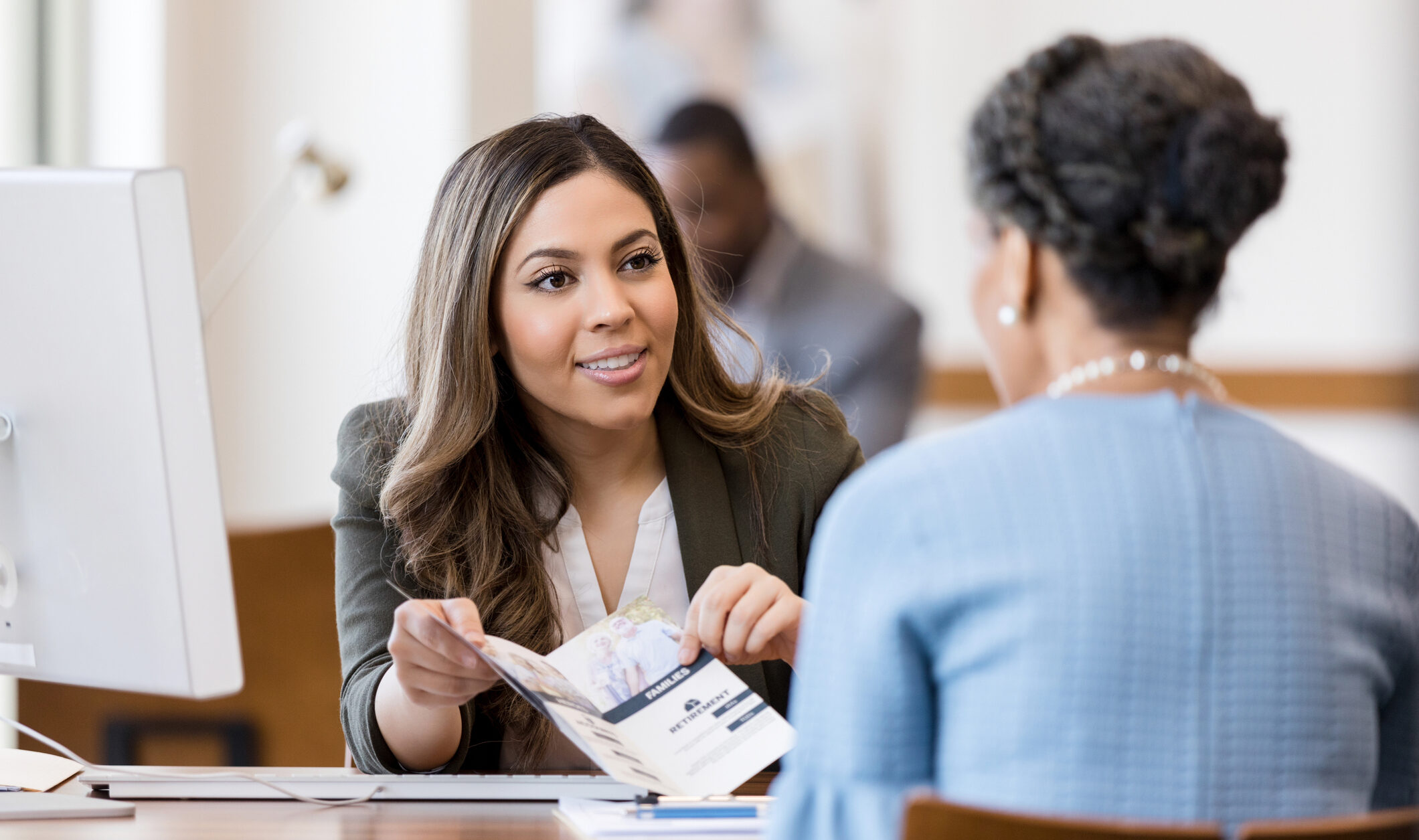 financial advisor talking to a client